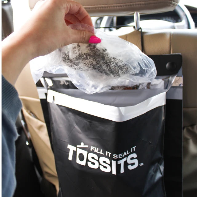 The car trash bag that hangs, seals, and tears off.