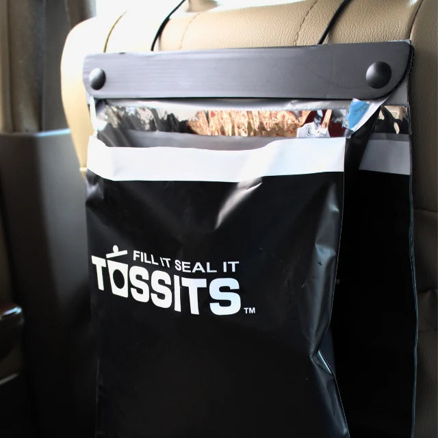 The car trash bag that hangs, seals, and tears off.