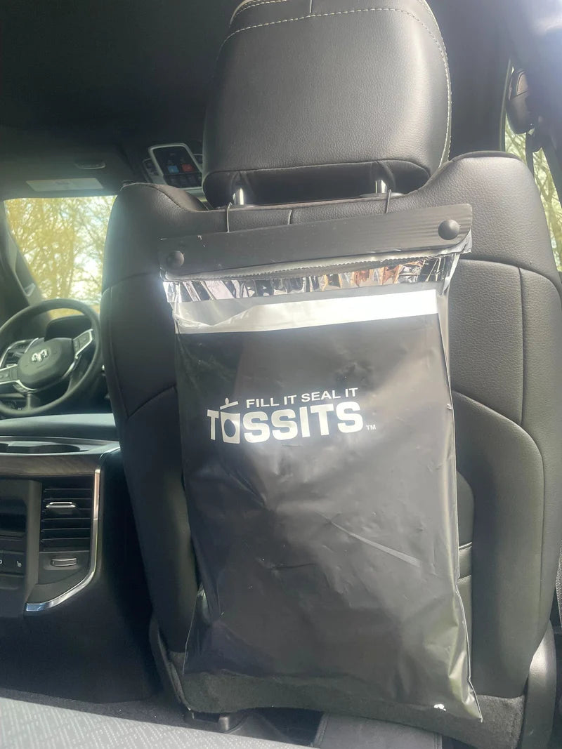 The car trash bag that hangs, seals, and tears off.
